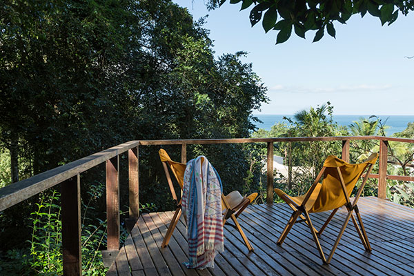 Jardim casa de praia com vista para o mar e para a Ilha Bela